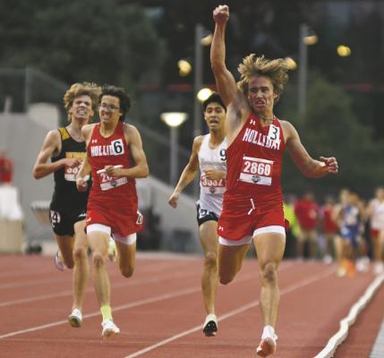 Holliday junior Noah Strohman throws his arm up as he crosses the finish line at state, followed closely behind by his twin brother, Ryder. Photo/Micah McCartney, Wise County Messenger