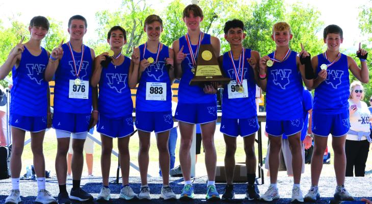 The Trojan Cross Country Team (Carson Anderle, Luke Zicarelli, Jackson Zicarelli, Nolan Schreiber, Kolton Rodgers, Braidan Messineo, and Harrison Humpert) took first place at the UIL Region 2 XC Championship on Monday, Oct. 21. Photo/Landon Davis