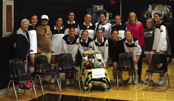 Head volleyball coach Krissa England and the Lady Cats honored the late Linnie Mae Hudson before their home game against the City View Lady Mustangs on Tuesday, Sept. 10. Photo/Landon Davis