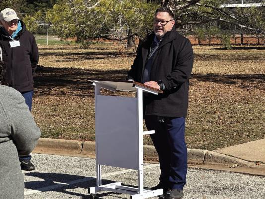 Vernon College Phi Theta Kappa advisor Jason Scheller addresses the crowd that attended the Athletic Park/Spudder Park Historical Marker dedication ceremony on Thursday, Feb. 13. Photo/Landon Davis