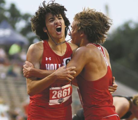 A glasses-less Ryder and Noah embrace after the two took second and first in the mile at state. Photo/Micah McCartney, Wise County Messenger