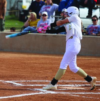 Sophomore starting pitcher Addi Canada belts a pitch for a Grand Slam against the Olney Lady Cubs on Tuesday, March 18. Photo/Landon Davis