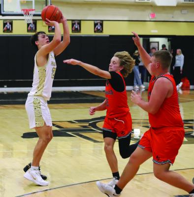 Archer City’s Maddox Mayo nails one of this two three-pointers in the fourth quarter versus Petrolia on Tuesday, Feb. 4. Photo/Landon Davis