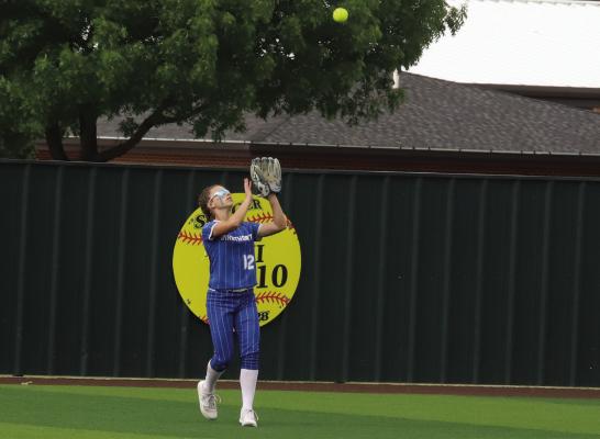 Sophomore Chloe Schroeder makes a catch from centerfield in the Trojanettes’ Area round matchup with Whitewright on Friday, May 2. Photo/Landon Davis