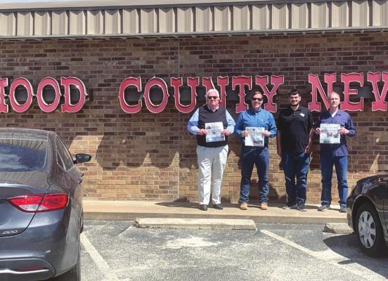 The Archer County News traveled with Co-Owner Dan Haile and Publisher Nathan Lawson to Granbury as the company finalized a priniting agreement with Hood County News. Also pictured is HCN publisher Sam Houston and Baylor County Banner publisher Matt Gwinn. Courtesy photo/Hood County News