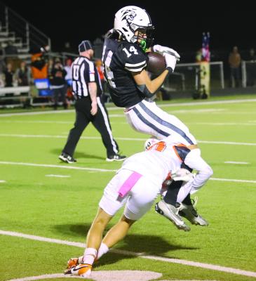 Wildcat wideout Reed Truette makes a tough grab in the air versus Petrolia on Friday, Oct. 31. File photo