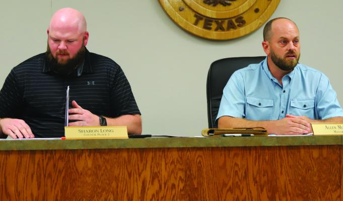 New Holliday City Council Member Place 2 Jacob Smyers (L) and Mayor Brad Litteken (R) were sworn into office during the Monday, May 13, council meeting. Photo/Landon Davis