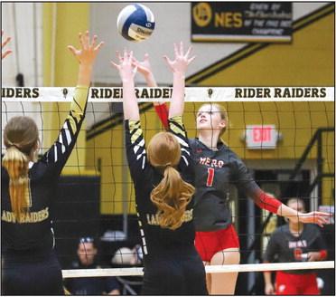 Lady Eagles Senior Peyton Fandler looks for a kill against Rider in Holliday's (25-17, 25-23, 25-20) victory on Friday, Sept. 2. Photo/Will Edwards