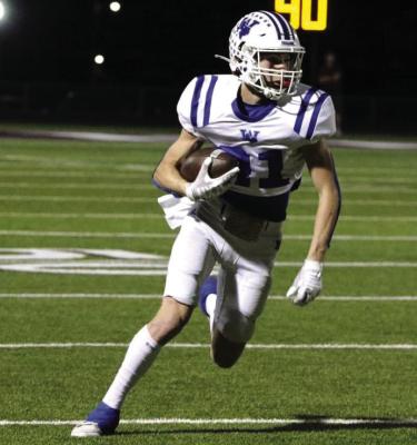 Trojan wideout Daxton Anderson looks for running room in Windthorst 48-8 win over the Seymour Panthers on Friday, Sept. 27. Courtesy photo/Jamie Anderle
