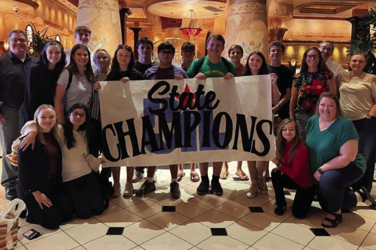 The Holiday High School Academic Team show off their 3A UIL State Academic champion banner after claiming the overall sweepstakes with 124.5 points. Courtesy photo