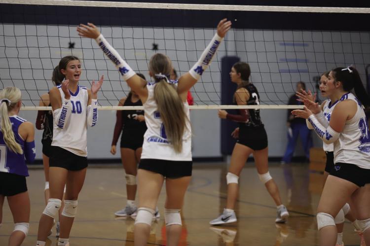 The Windthorst Trojanettes celebrate a point in their 2-0 (25-20, 25-8) win over the Vernon Lady Lions on Tuesday, Aug. 18. Photos/Rolando Medina