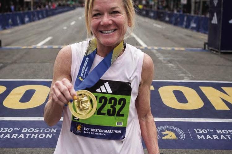 Cecilia Vieth Holt, a 1986 graduate of Windthorst ISD, completed her fifth marathon at the Boston Marathon on April 20, 2026, setting a personal record with a time of 3 hours and 45 minutes, Courtesy photo