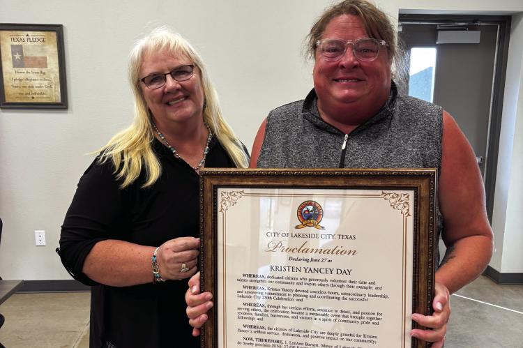 Lakeside City Mayor LeeAnn Burnett (left) presented Kristen Yancey with a proclamation declaring June 27 as Kristen Yancey Day in Lakeside City during the Lakeside City meeting July 21. Photo/Callie Lawson