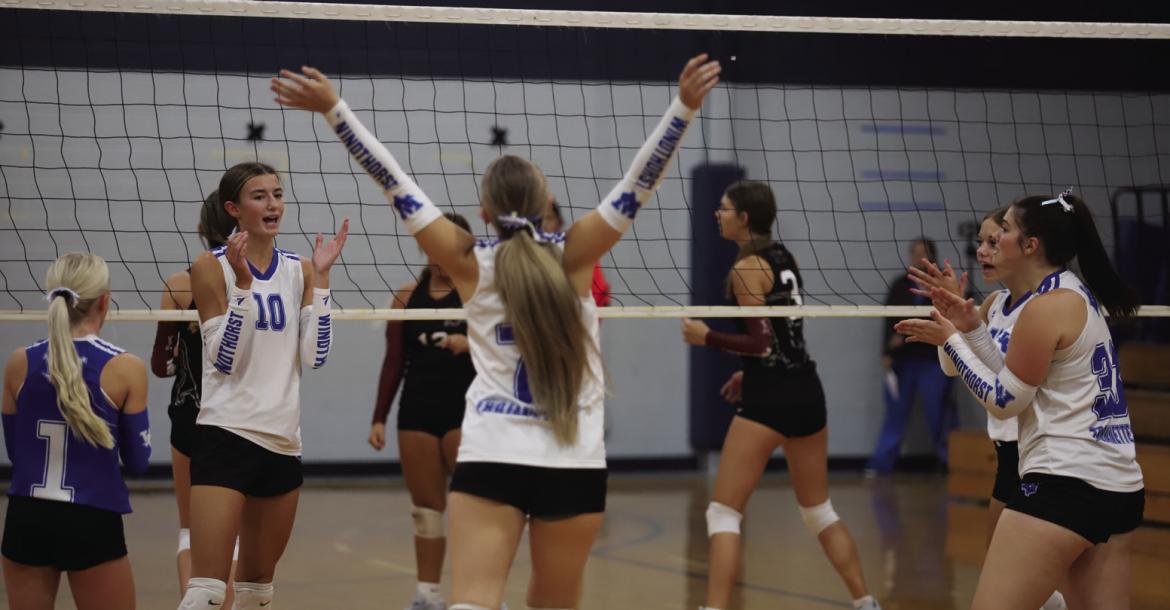 The Windthorst Trojanettes celebrate a point in their 2-0 (25-20, 25-8) win over the Vernon Lady Lions on Tuesday, Aug. 18. Photos/Rolando Medina