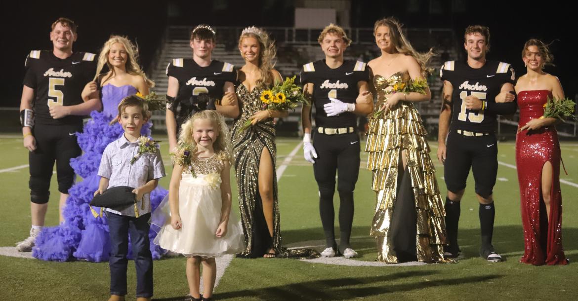 The Archer City High School homecoming court from left to right: Noah Reneau, Ashlyn Harvey, Homecoming King Gage McCord, Homecoming Queen Ella Golihugh, Brayden Tedrow, Jocelyn Tedrow, Seth Truette and Millie Mayo. Front: Kassidy Marin, crown bearer Brian Boone and flower girl Bristol Hughes. Photo/Nathan Lawson