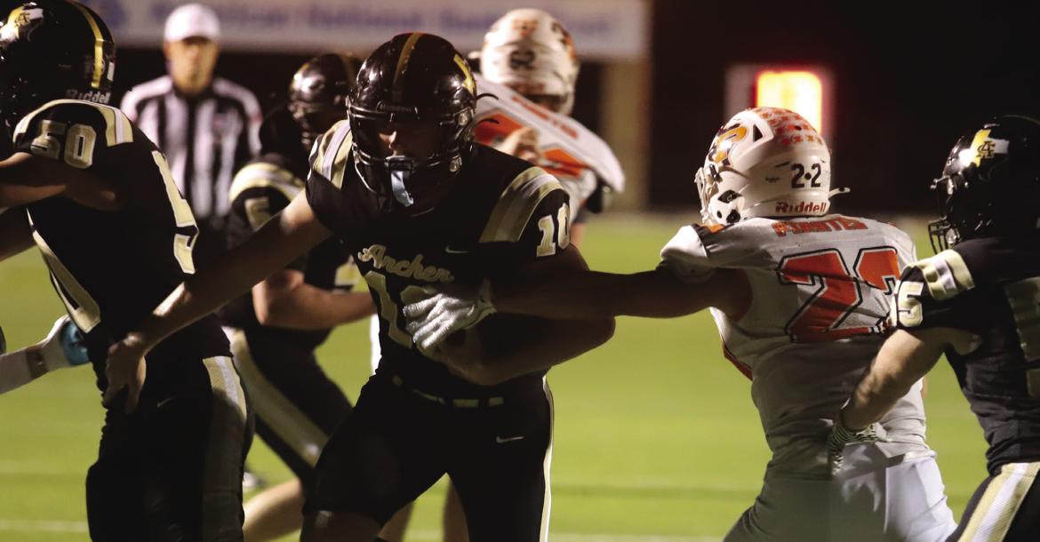 Archer City Sophomore Kreid Edwards hits the hole during the Wildcats 42-30 loss to the Petrolia Pirates on Friday, Oct. 2. Photo/Rolando Medina