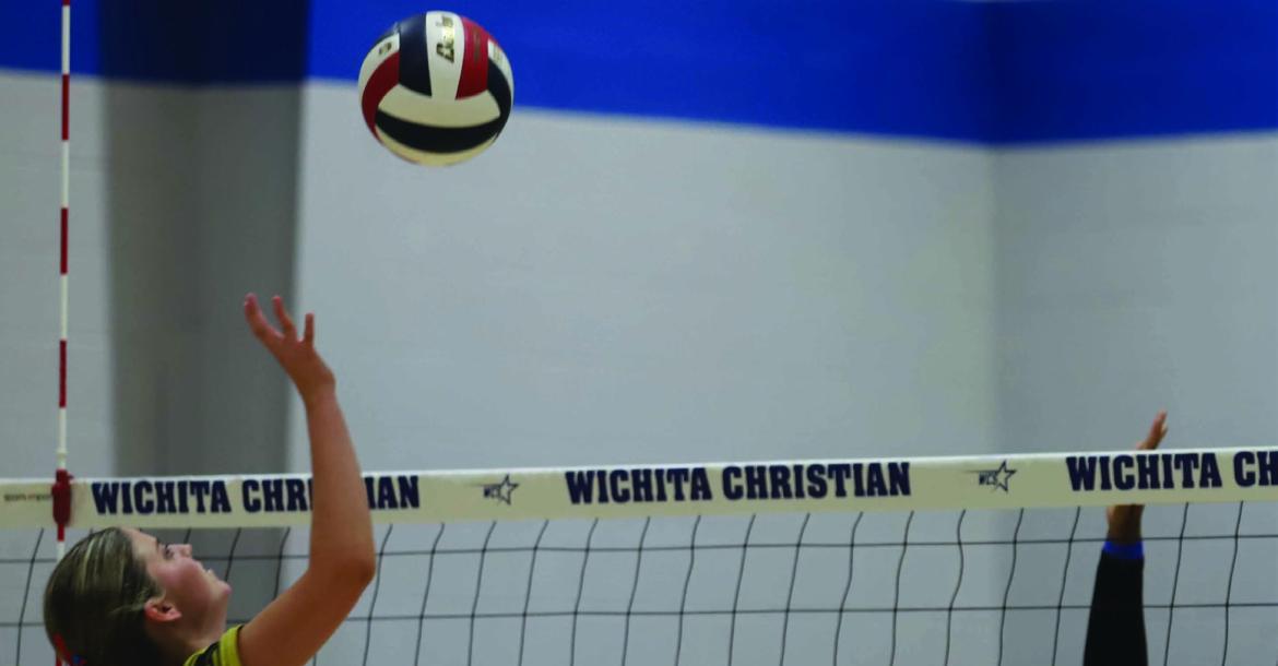 Lady Cats Senior Jocelyn Tedrow rises up for a kill attempt in Archer City's comeback win against Wichita Christian on Tuesday, Aug. 18. Photo/Rolando Medina