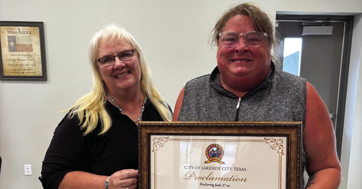 Lakeside City Mayor LeeAnn Burnett (left) presented Kristen Yancey with a proclamation declaring June 27 as Kristen Yancey Day in Lakeside City during the Lakeside City meeting July 21. Photo/Callie Lawson