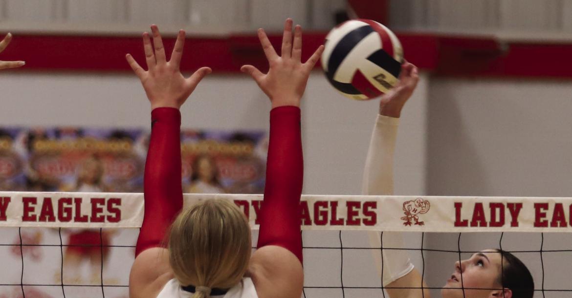 Lady Eagles Outside Hitter Camdyn Stapleton looks for a kill during the Lady Eagles 3-2 loss to Memorial on Tuesday, Sept. 8. Photo/Rolando Medina