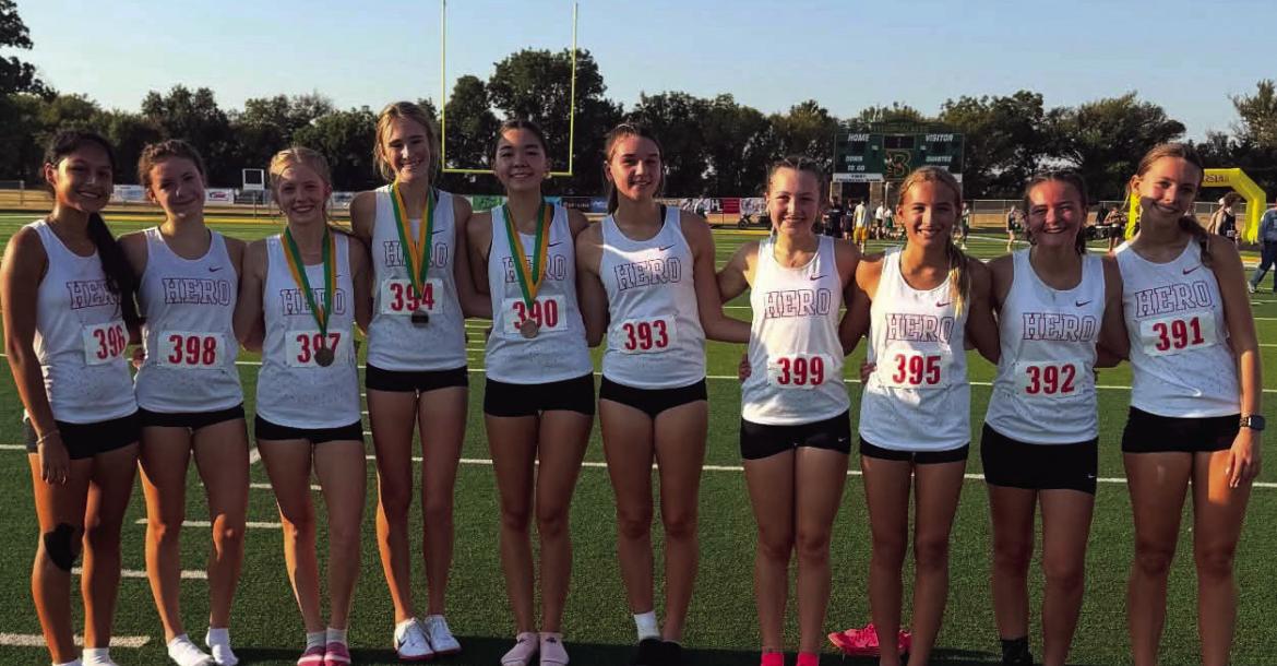 The Holliday Lady Eagles pose for a photo following their first place finish at the Boyd Yellow Jacket Invitational on Friday, Aug. 28. Courtesy photo